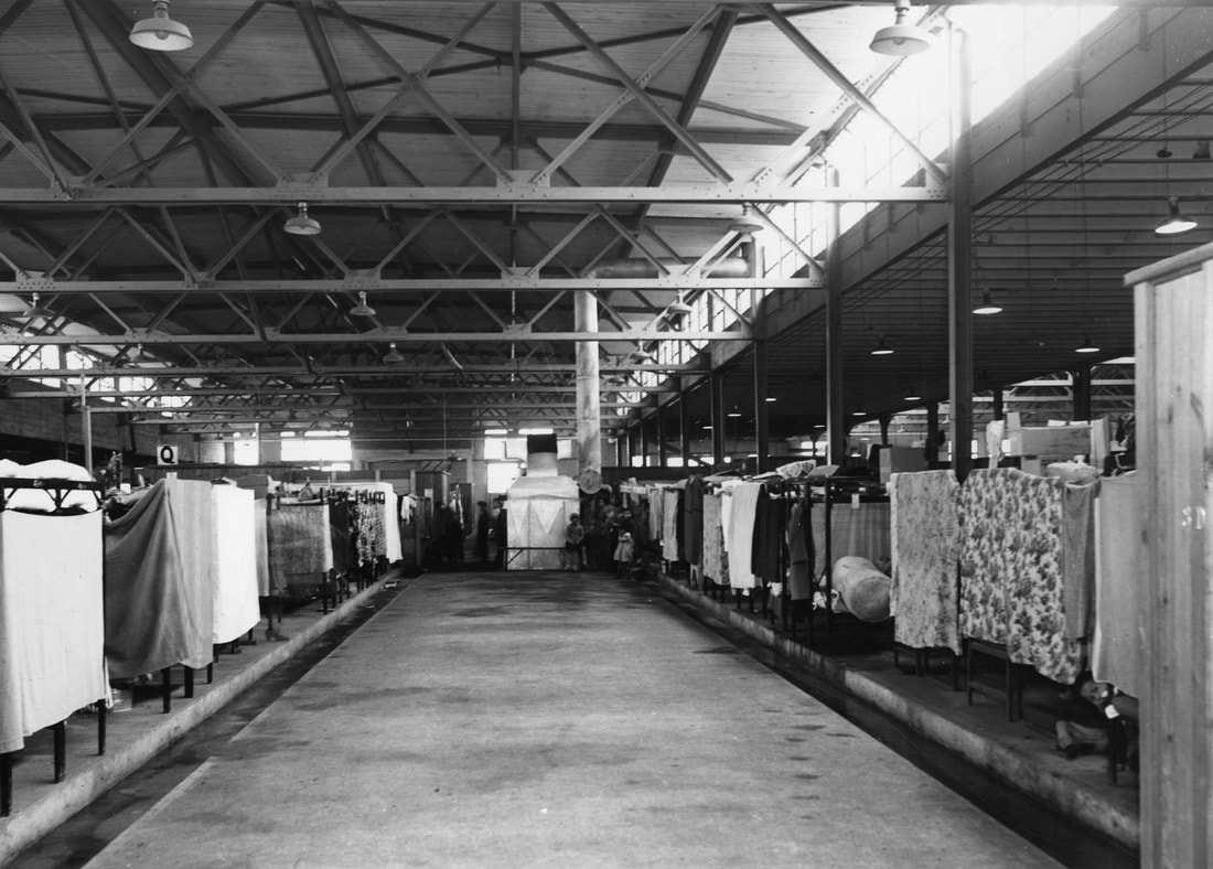 Inside of a livestock building converted to house Japanese-Canadian women and children
