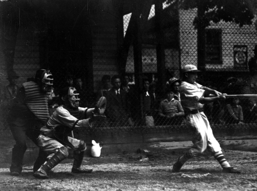 Member of all Japanese-Canadian baseball team is up to bat